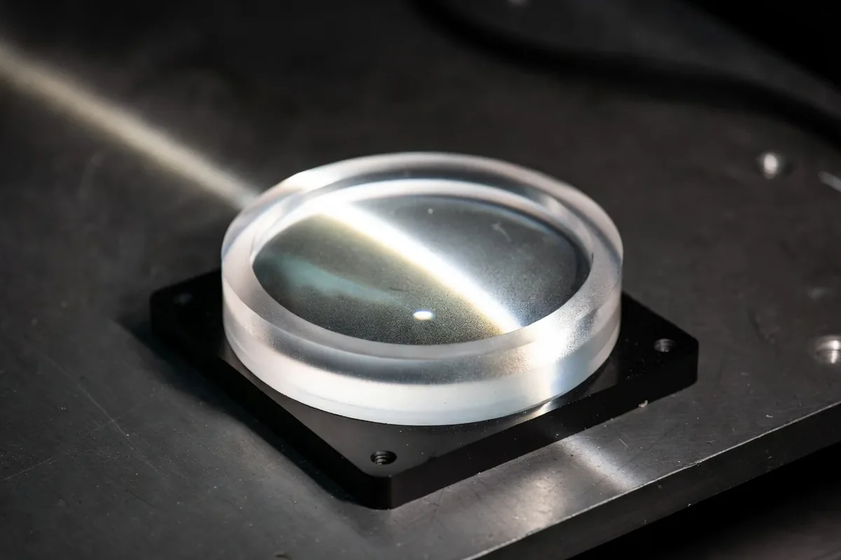Optically clear resin lens prototype polished to transparency