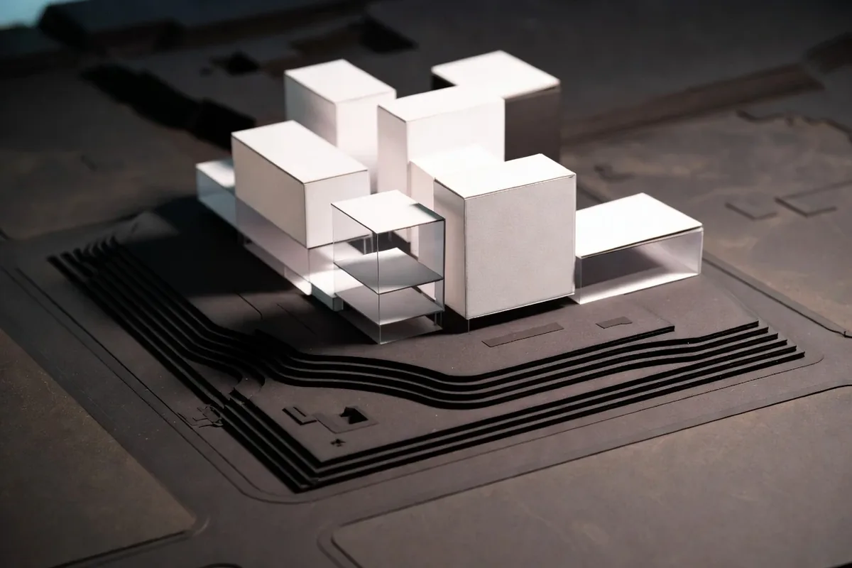 Multi-block development site model with removable buildings