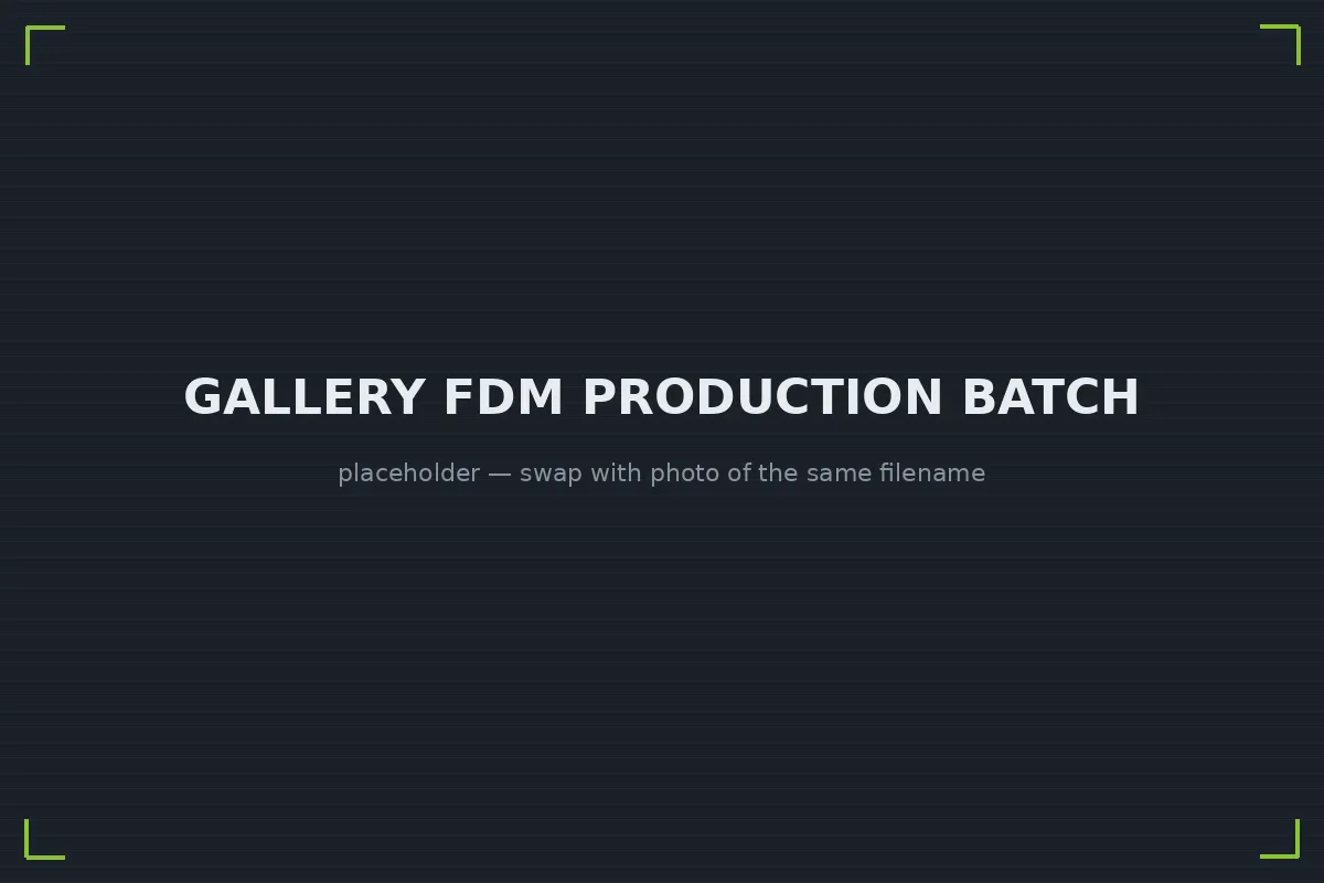 Batch of identical FDM production parts arranged on a build plate