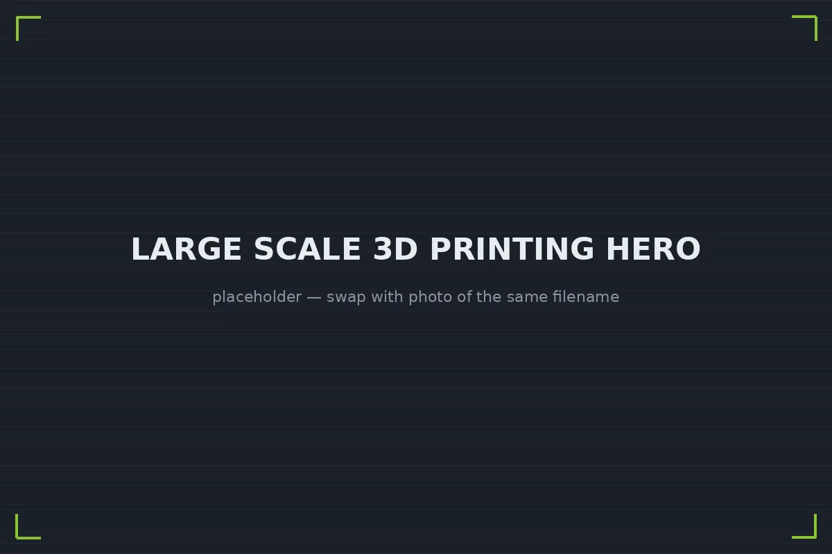 Technician assembling large sectioned 3D printed sculpture pieces into a single oversized form
