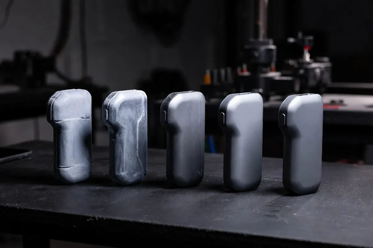 Row of prototype iterations of the same product design lined up from rough to refined